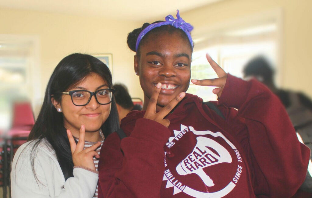 Two Real Hard program participants smiling